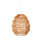 Barrel shaped rattan pendant with open weave shown from a slightly different angle on white