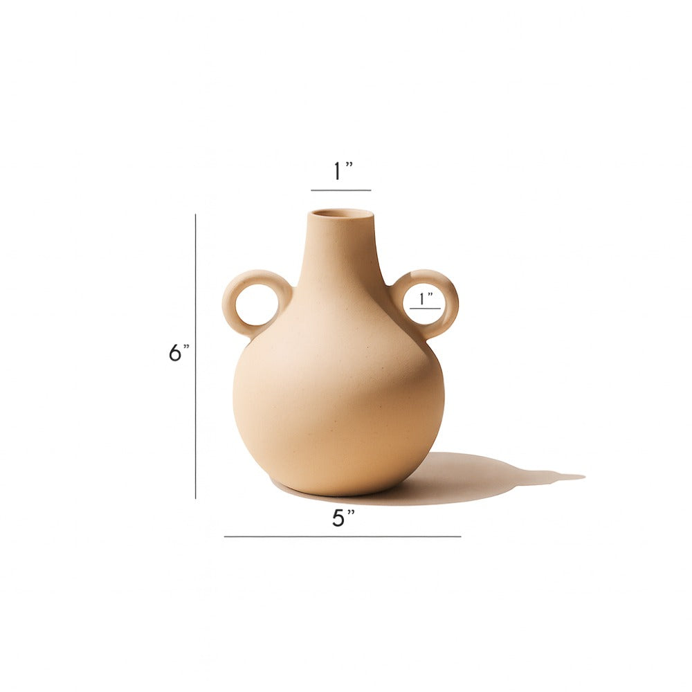 Cream Harappan vase with size markings showing roughly 6 inch height