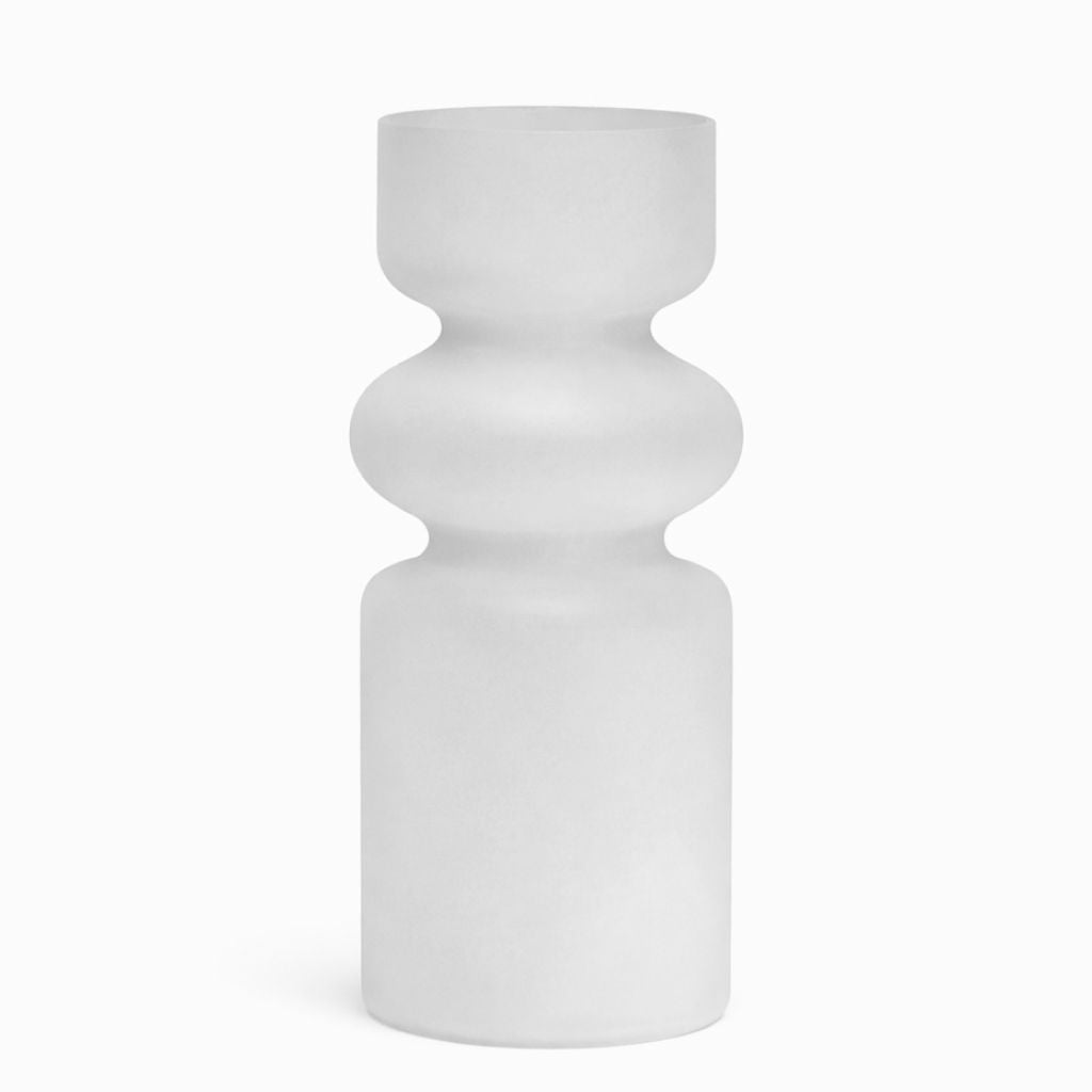 Frosted glass bud vase with rounded symmetrical tiers on a pale backdrop