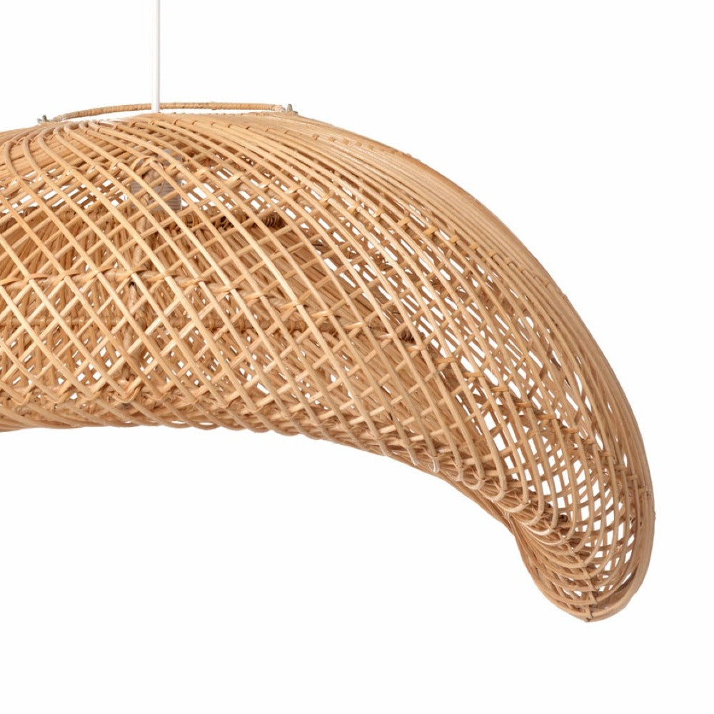 Large elongated woven rattan pendant shade showing its gentle arched wave shape