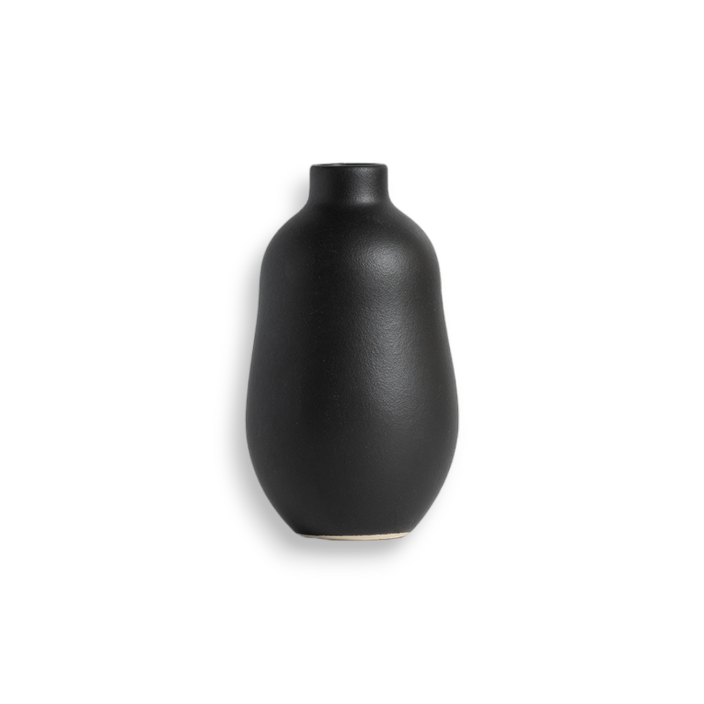 Matte black Gharyan stoneware bud vase with a softly rounded silhouette