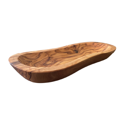 Wooden serving board with a wavy edge on a white background by the rituals collection calmly elevated