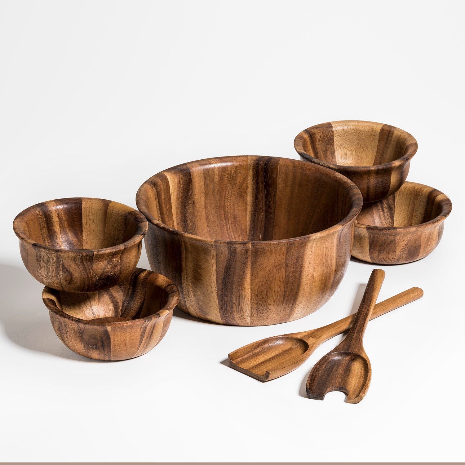 Set of wooden bowls and spoons by calmlyelevated.com