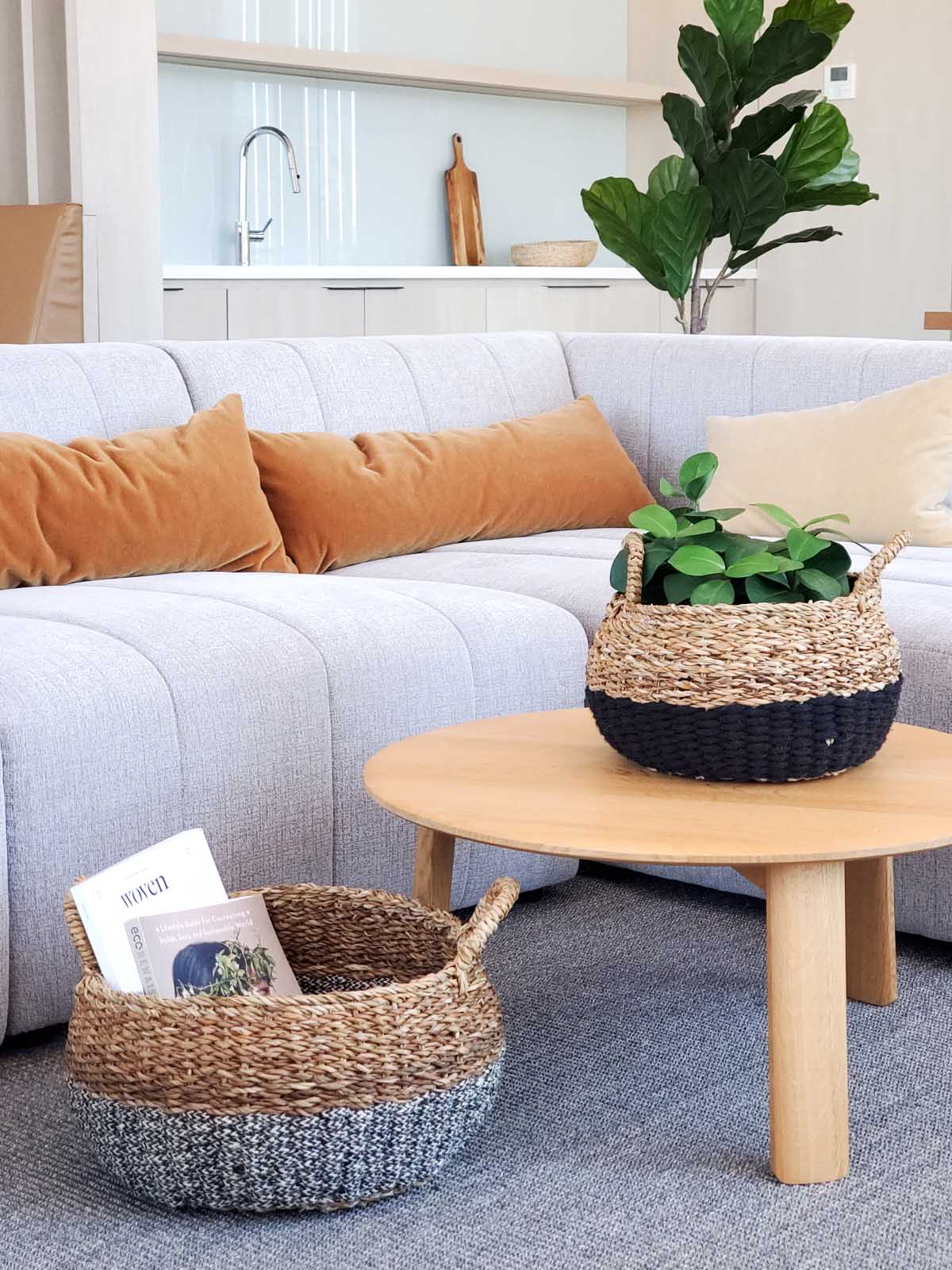 Ula Floor Basket set of two styled in living room as floor storage — Calmly Elevated