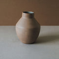 Wheel thrown Al Centro terracotta vase with a rounded urn form and short neck