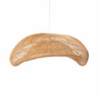 Wide curved rattan pendant with open weave shown from the side on a white background
