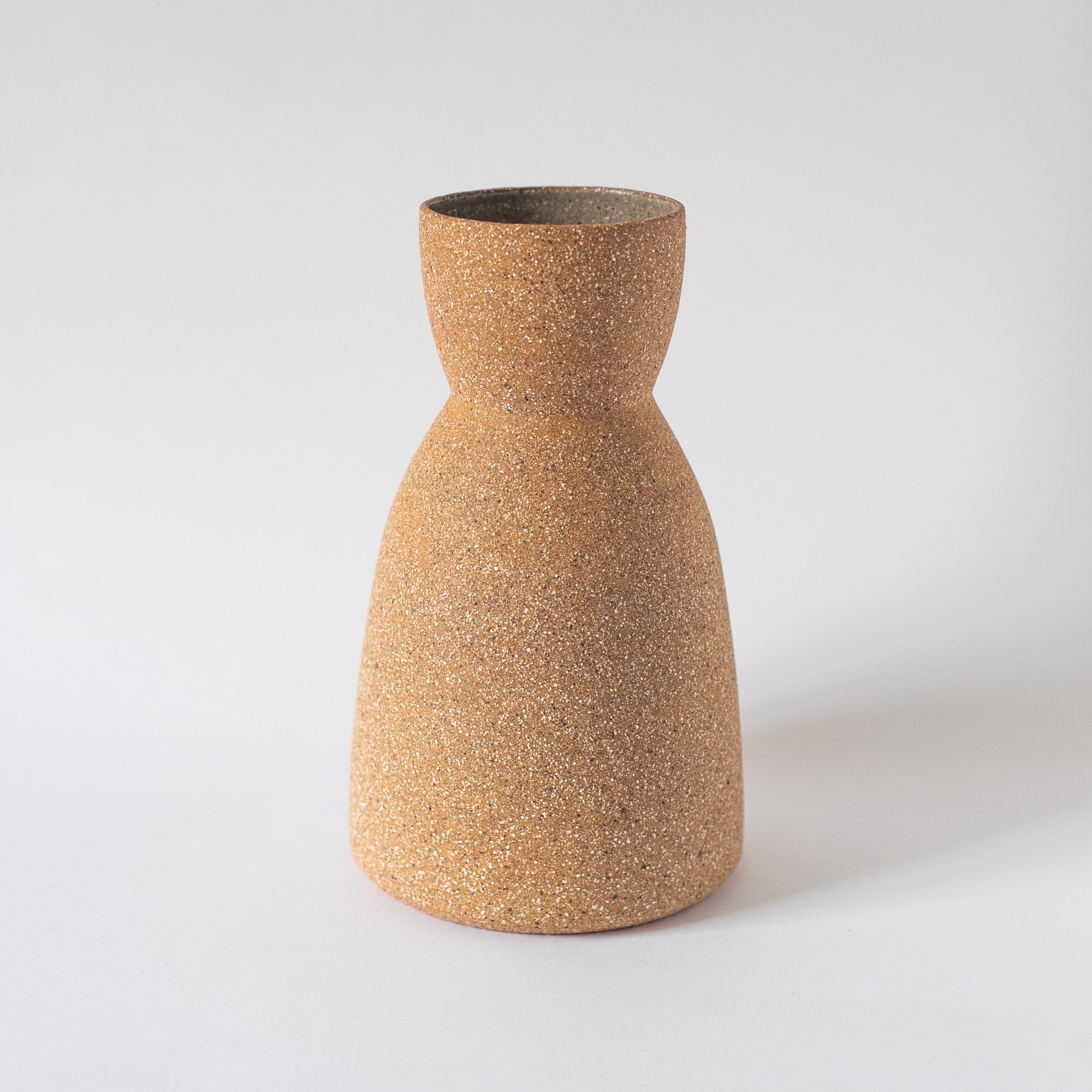 Reloj ceramic vase styled with dried botanicals on neutral minimalist shelf — Calmly Elevated