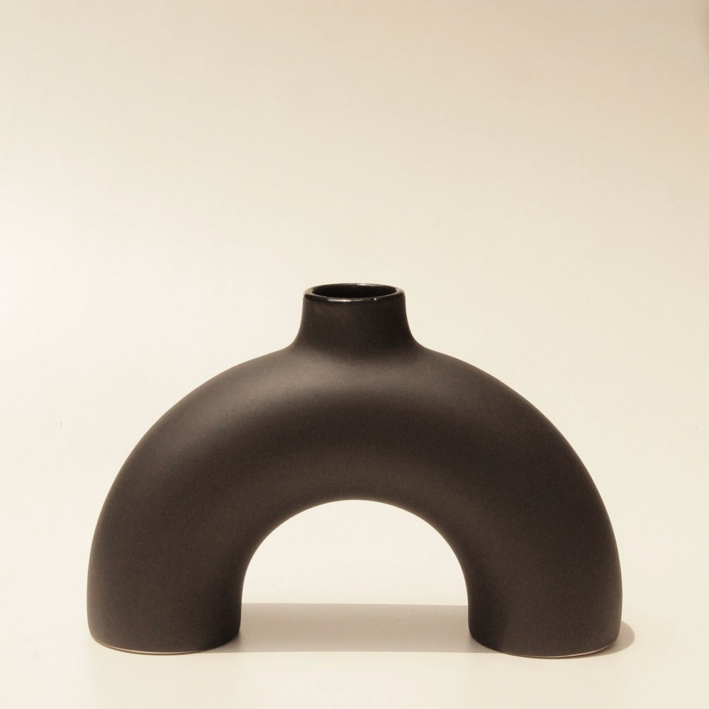 Half Polo black vase paired with full Polo vase on neutral shelf — Calmly Elevated