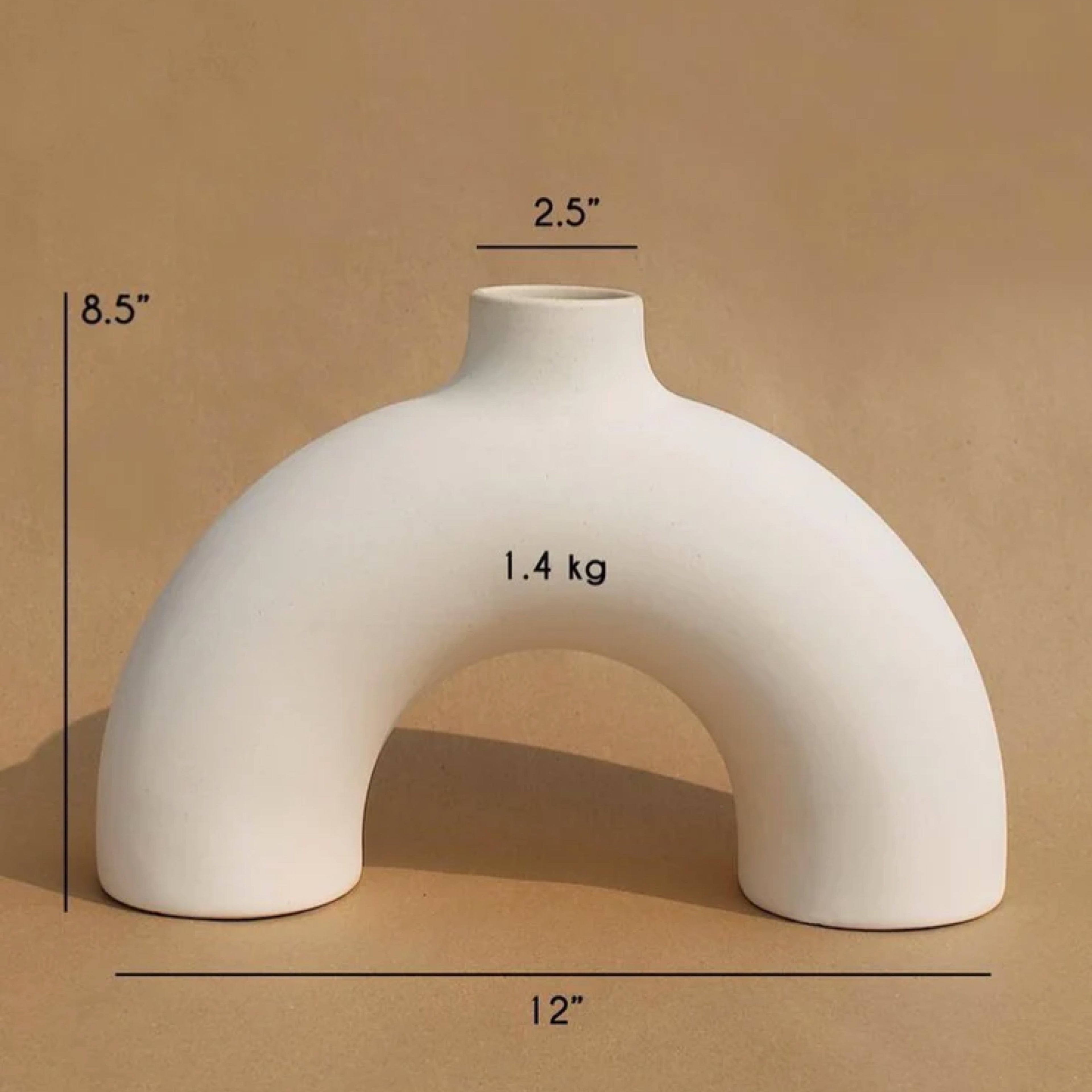 Half Polo black semi-circular sculptural ceramic vase by Osmos Studio — Calmly Elevated