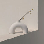 Half Polo white vase side view showing sculptural half-form silhouette — Calmly Elevated