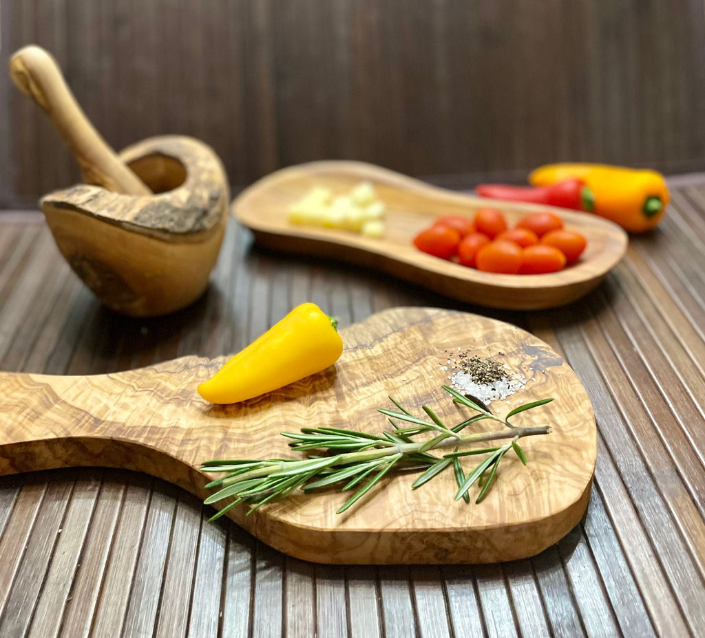 Olive wood kitchen collection pieces styled together, artisan tableware — Calmly Elevated