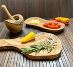 Olive wood kitchen collection pieces styled together, artisan tableware — Calmly Elevated