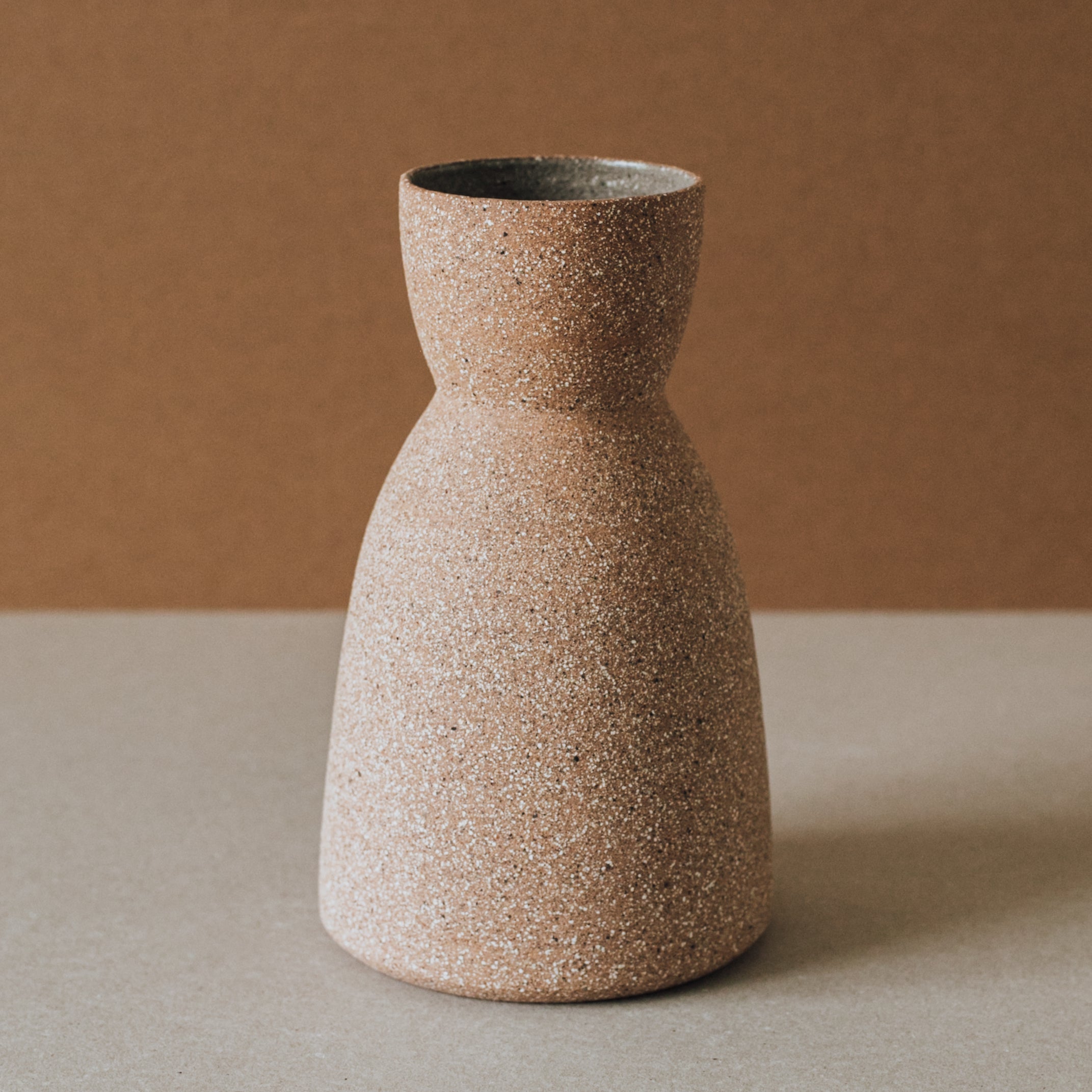 Reloj hourglass ceramic vase wheel-thrown by Al Centro Ceramica, raw earth tones — Calmly Elevated