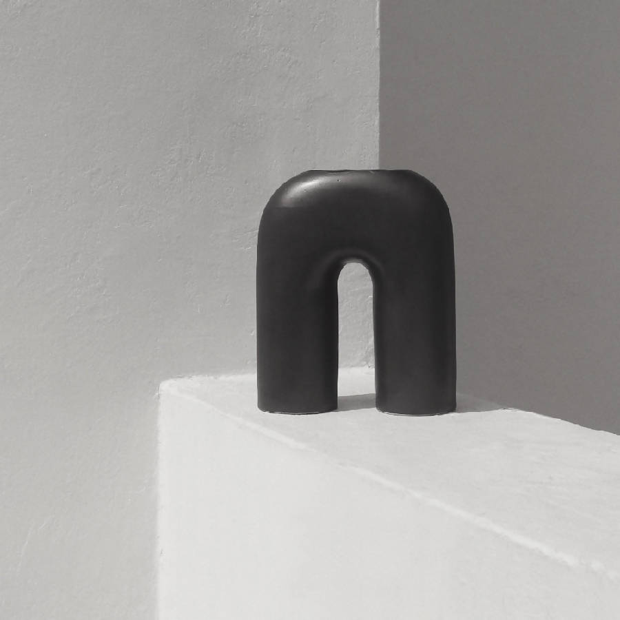 Zo black inverted-U sculptural ceramic vase by Osmos Studio — Calmly Elevated