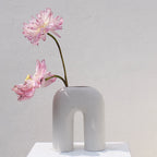 Zo white sculptural vase styled as contemporary art object on console —Calmly Elevated